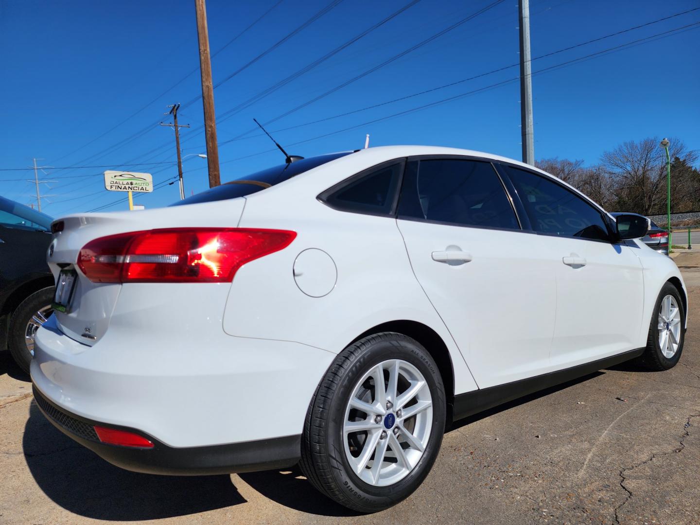 2016 WHITE Ford Focus SE (1FADP3F24GL) with an 2.0L L4 DOHC 16V engine, AUTO transmission, located at 2660 S.Garland Avenue, Garland, TX, 75041, (469) 298-3118, 32.885551, -96.655602 - Welcome to DallasAutos4Less, one of the Premier BUY HERE PAY HERE Dealers in the North Dallas Area. We specialize in financing to people with NO CREDIT or BAD CREDIT. We need proof of income, proof of residence, and a ID. Come buy your new car from us today!! This is a Super Clean 2016 FORD FOCUS - Photo#3